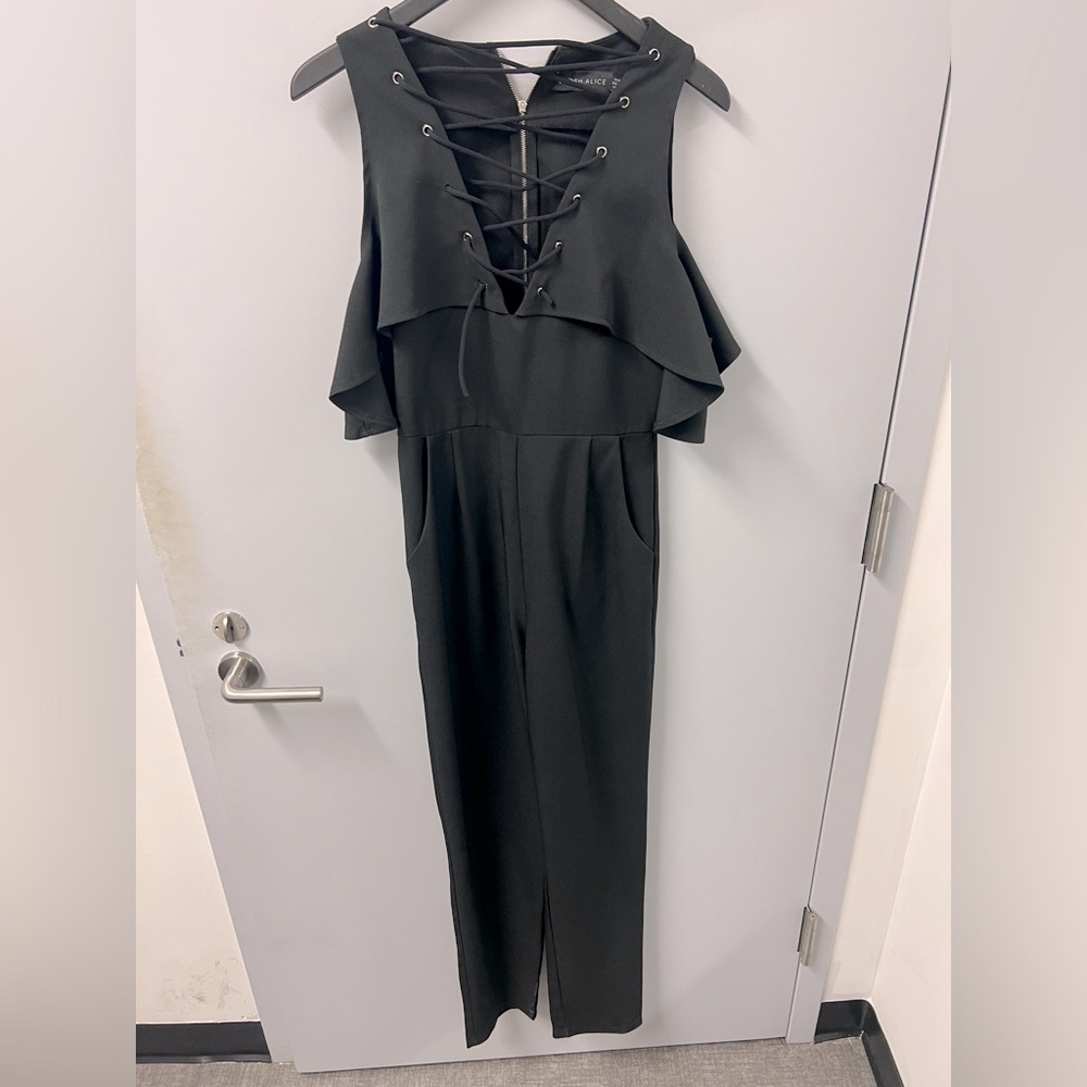 LAVISH ALICE Black, sexy, flattering but comfortable jumpsuit ! Size 4.